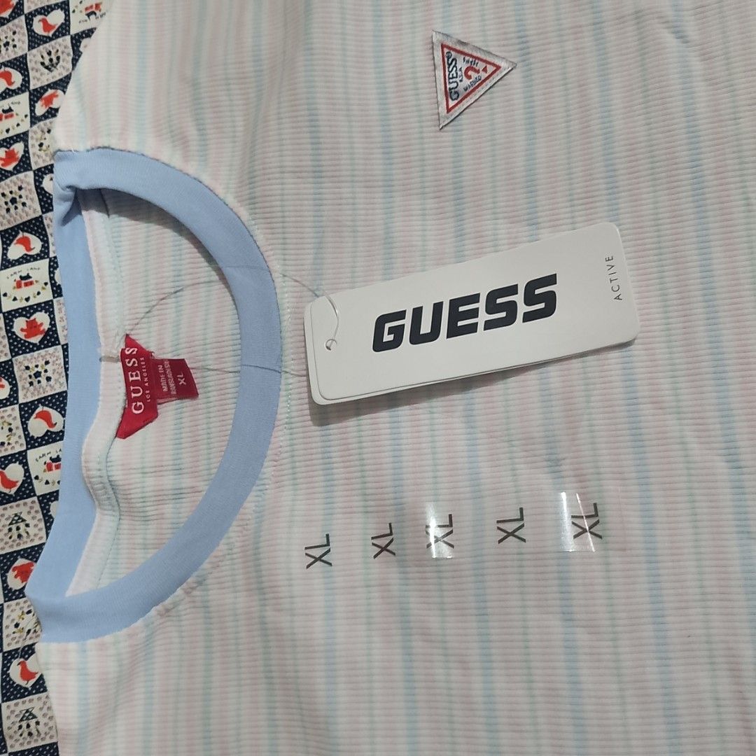 Guess Active Striped Blue and White Ringer Tee XL NWT (Category: Shirts) located in Santa Rosa. Submitted by prlvdbyellie (Listing ID 1461631598, Image 3). Description: Size XL on tag #guess #guessactive #stripedtee #ringertee #y2kstyle #sportychic #brandnew #carousellph.
