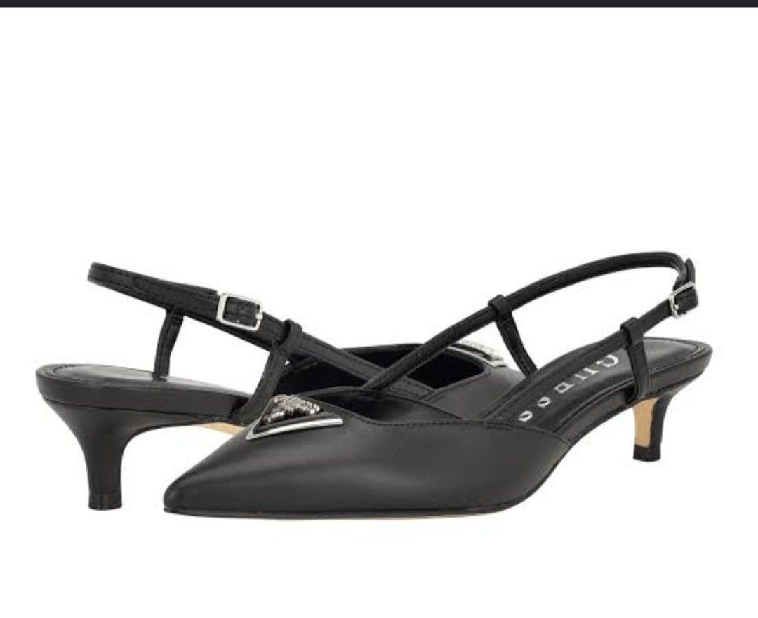 Guess Black Slingback Kitten Heels with Embellishment (Category: Heels) located in Manila. Submitted by nicuuul10 (Listing ID 1461593496, Image 1). Description: - Guess black slingback heels - Pointed toe - Kitten heel - Cute triangle embellishment on the front - Adjustable buckle strap - Perfect for dressing up or down.