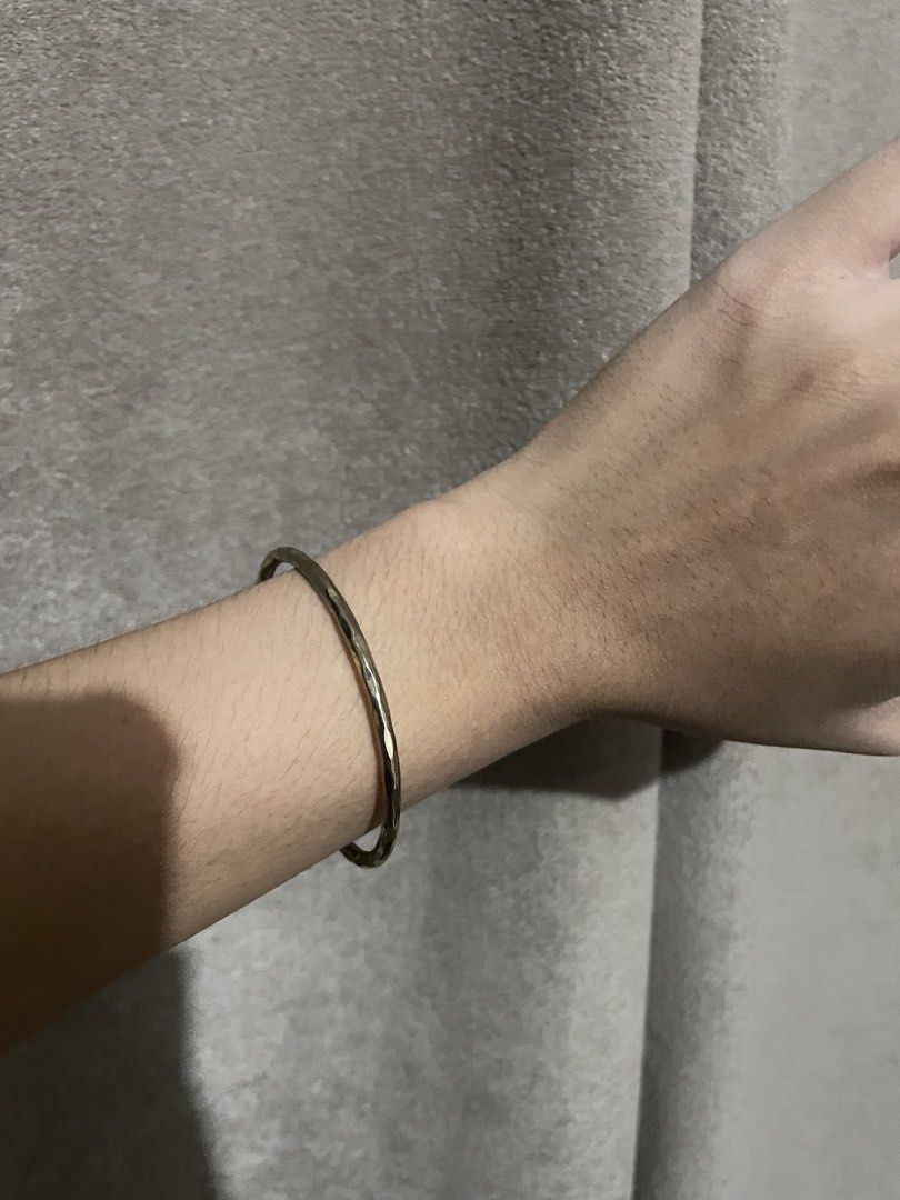 Hammered Gold Tone Cuff Bracelet with Ball Ends (Category: Bracelets) located in Talisay. Submitted by mrjannchristian (Listing ID 1461755730, Image 3). Description: MACY’S Plated Stainless Solid Steel Bangle - Bought in LA - Gold-tone cuff bracelet - Hammered texture all over - Small ball details at the ends - Open cuff style, adjustable for a perfect fit - Versatile: wear it solo or stack with other bracelets - Classic and simple design for eve