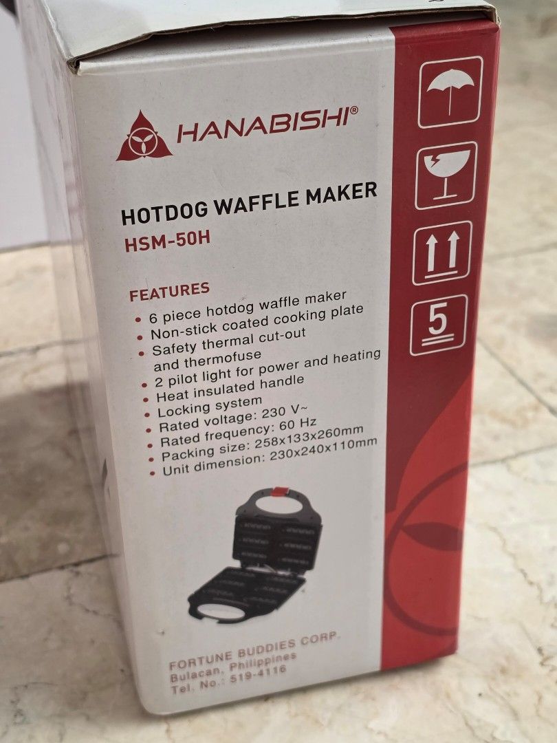 Hanabishi Hotdog Waffle Maker HSM-50H (Category: Other Kitchen Appliances) located in Caloocan City. Submitted by bravemountain_ddc4bf (Listing ID 1461609372, Image 2). Description: - Hanabishi Hotdog Waffle Maker, Model HSM-50H - Makes 6 hotdog waffles at once - Non-stick coated plates for easy cleaning - Safety thermal cut-out for secure operation - 2 pilot lights (power and heating indicator) - Convenient locking system - Operates on 230V - Id