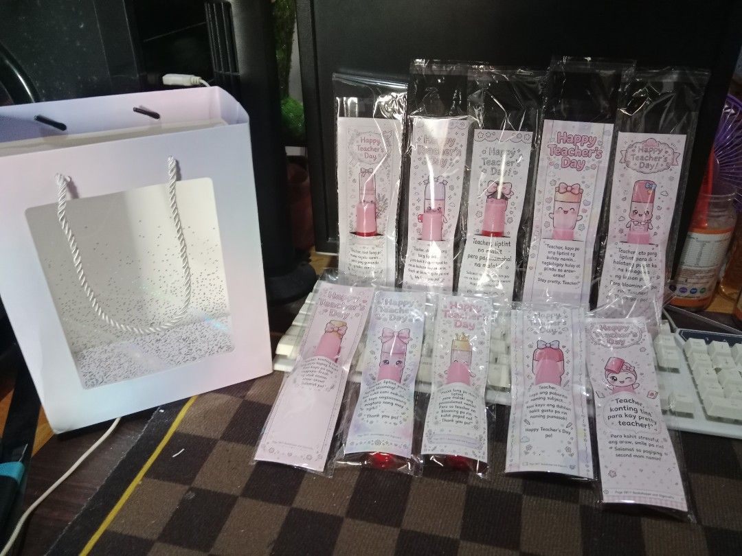 Happy Teacher's Day Liptint Gift Set (Category: Stationery & School Supplies) located in Bulacan. Submitted by page5877bookshoppe (Listing ID 1461667436, Image 3). Description: - Perfect Teacher's Day gift - Cute liplint with a sweet message - Available in different designs - Features pink liplints - A thoughtful way to show appreciation 10 pcs. available .