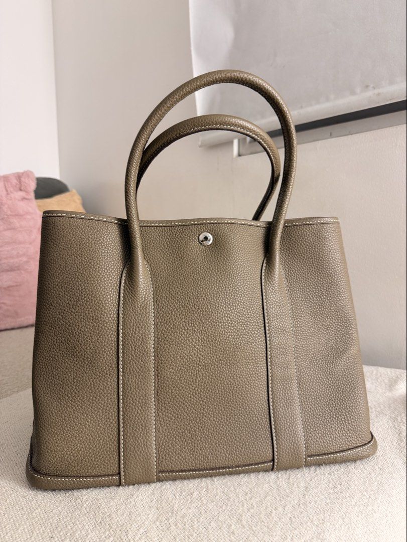 Hermes Garden Party Tote Bag (Category: Luxury Bags & Wallets) located in Manila. Submitted by bellsuaverdez (Listing ID 1461772409, Image 1). Description: Hermès Garden Party Color: Étoupe 2nd owner, rarely use RSF: decluttering, too many bags .