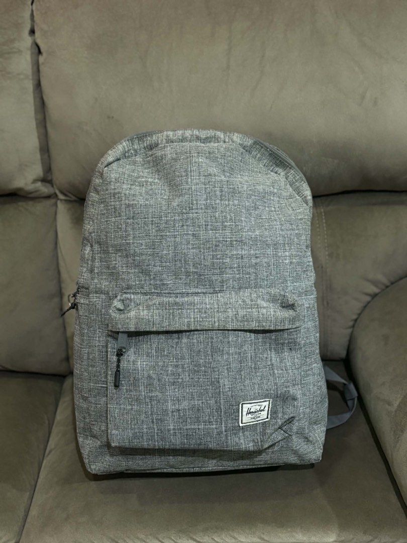 Herschel Grey Backpack with 2 Big Zipper Compartments (Category: Backpacks) located in Cebu City. Submitted by preloved.mae (Listing ID 1461582053, Image 2). Description: * Original. * Zipper’s paint chipped. Price: 2,000 (negotiable) —> Bought for approx. 4-6k.