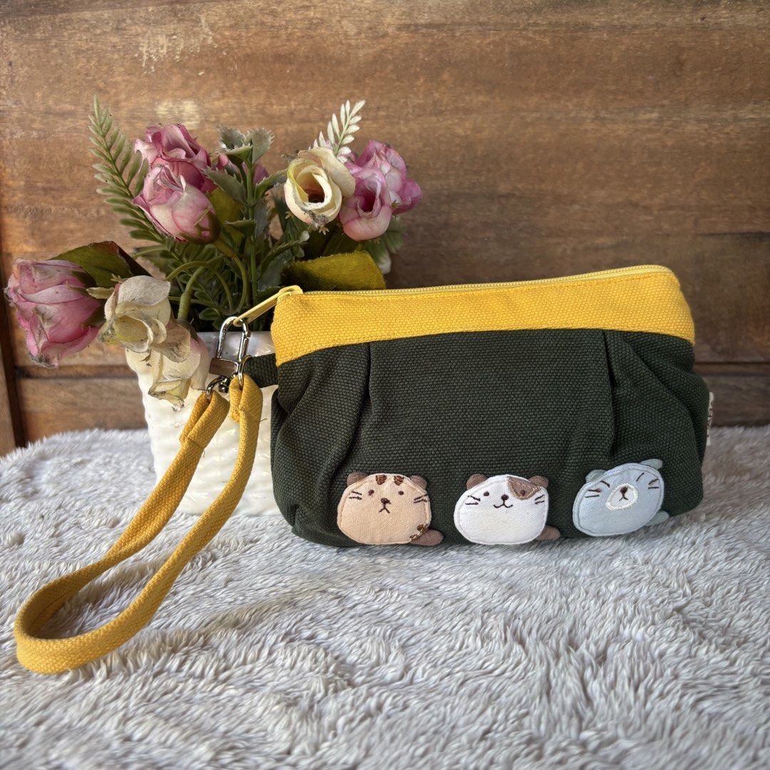 Hikosen Cara Canvas Wristlet wallet (Category: Wallets & Card holders) located in Tarlac. Submitted by alta.mayo (Listing ID 1461772140, Image 1). Description: • ykk zip • 6.5 x 4.5 inches • with 2 cardslot Guaranteed 💯% Authentic ❎ No Reservation 📌 Mop: Gcash 📌 Courier: JNT 📌 Location: Tarlac.
