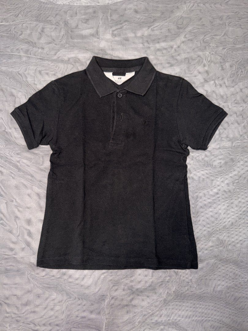 H&M Black Polo Shirt (Category: Babies & Kids Fashion) located in Caloocan City. Submitted by mrynn_declutter (Listing ID 1461621254, Image 1). Description: .