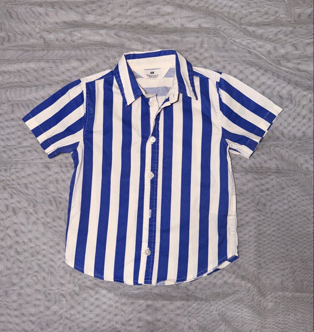 H&M Blue Stripes Polo (Category: Babies & Kids Fashion) located in Caloocan City. Submitted by mrynn_declutter (Listing ID 1461623413, Image 1). Description: Fits 2-3 yo.