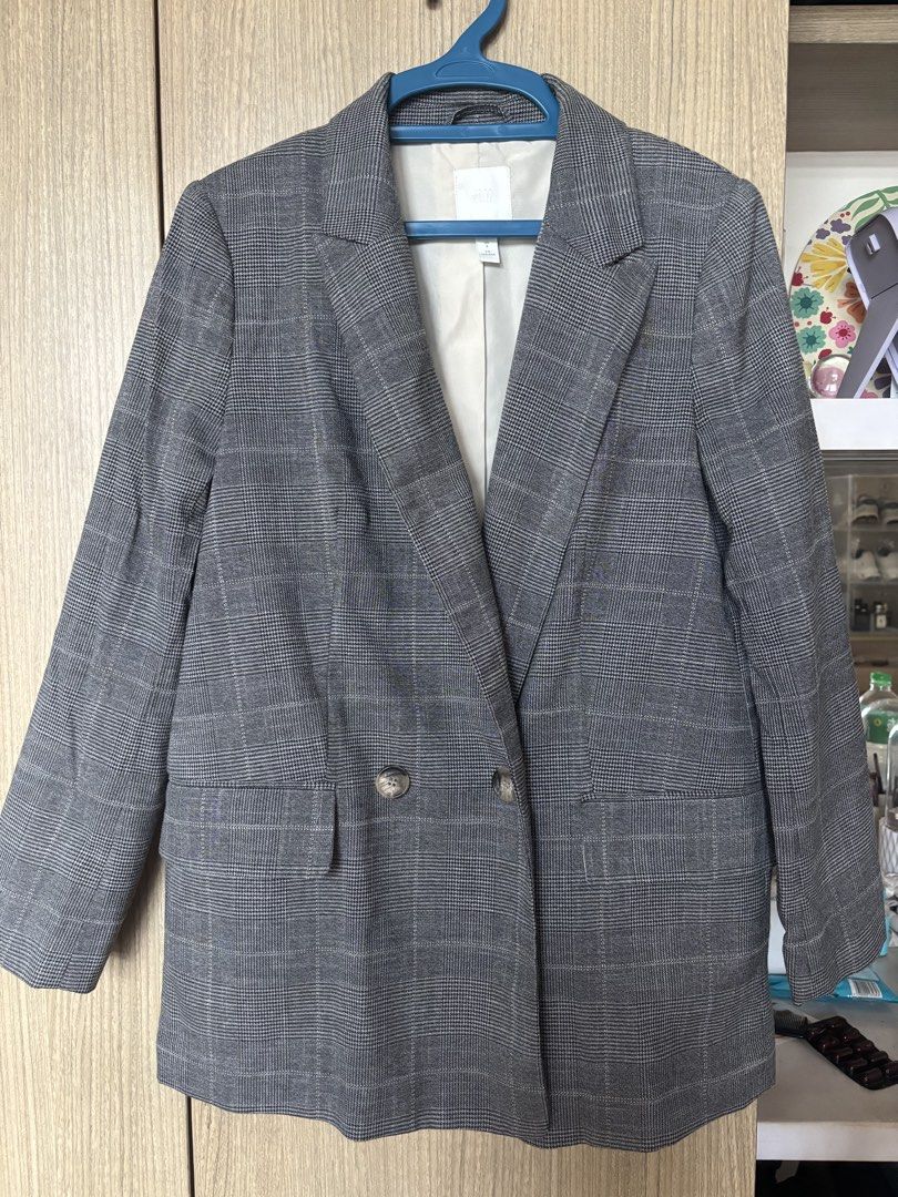 H&M Grey Plaid Double-Breasted Blazer (Category: Coats, Jackets and Outerwear) located in Makati City. Submitted by vikkidee (Listing ID 1461716954, Image 1). Description: - H&M Grey Plaid Blazer - Double-breasted with two buttons - Front pockets - Size: 36 EUR / 8 UK, can be worn as oversized.