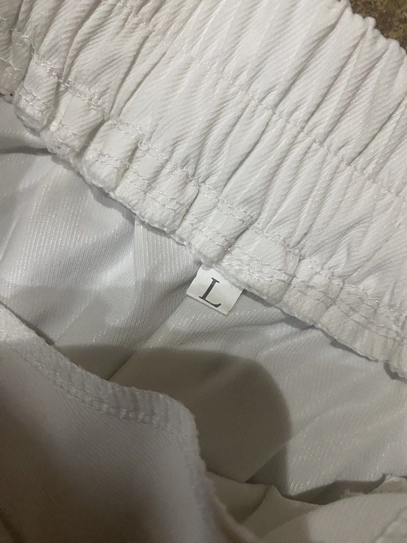 H&M White Shorts & White Skirt Bundle (Category: Babies & Kids Fashion) located in Binan City. Submitted by maggierabi01434 (Listing ID 1461794436, Image 3). Description: - Bundle deal: White H&M shorts and white skirt - Shorts: H&M, Size EUR 32 / US 2 - Skirt: Size L - Ideal for casual outings or school attire.