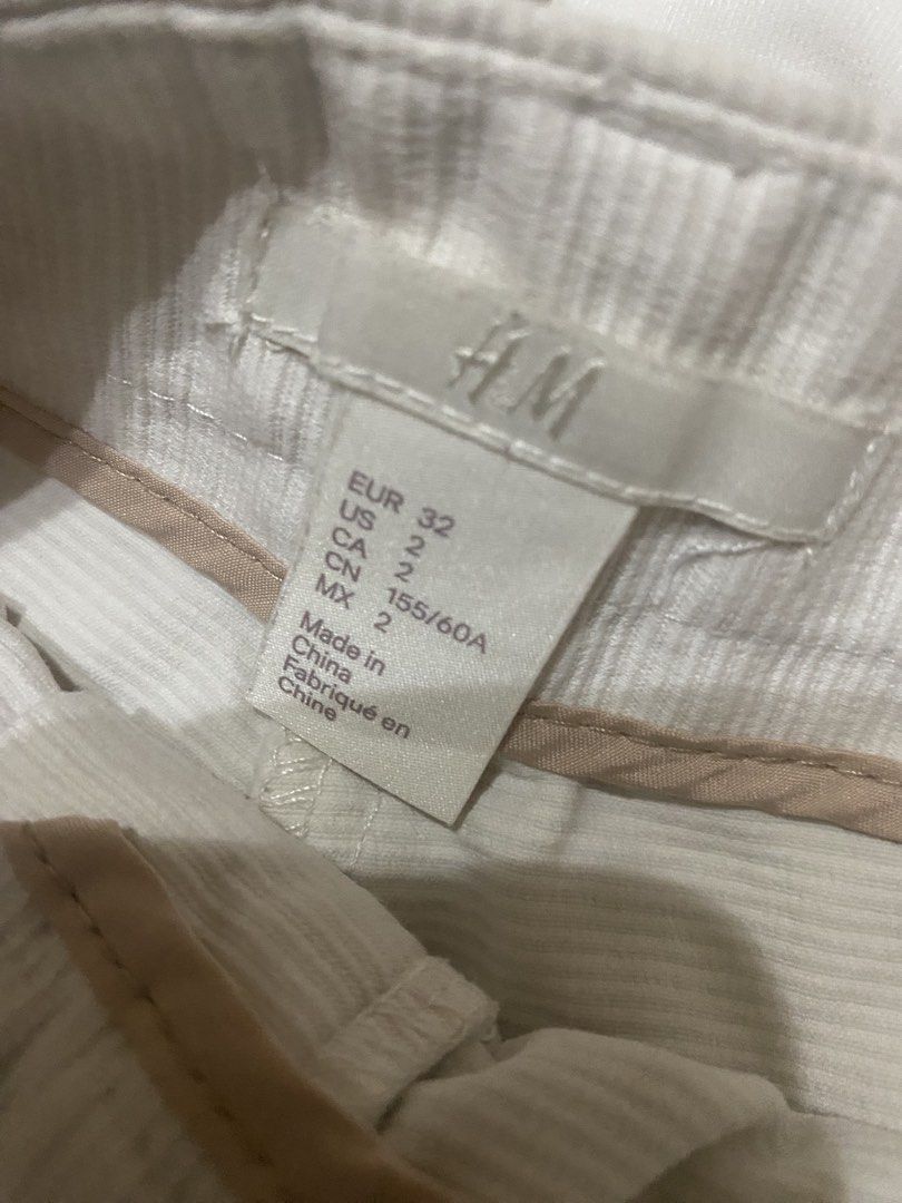 H&M White Shorts & White Skirt Bundle (Category: Babies & Kids Fashion) located in Binan City. Submitted by maggierabi01434 (Listing ID 1461794436, Image 2). Description: - Bundle deal: White H&M shorts and white skirt - Shorts: H&M, Size EUR 32 / US 2 - Skirt: Size L - Ideal for casual outings or school attire.