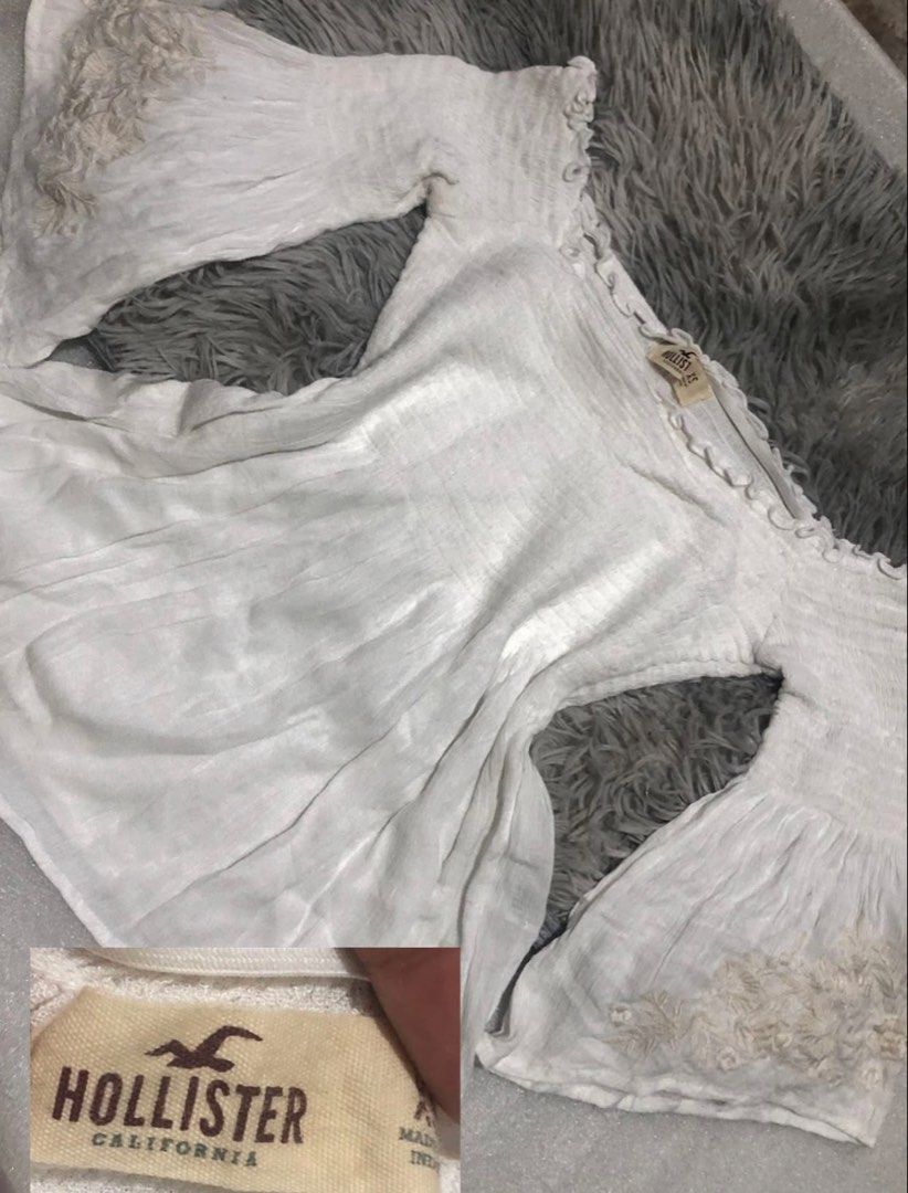 Hollister White Off Shoulder Top (Category: Others Tops) located in Manila. Submitted by mayet_459 (Listing ID 1461723147, Image 2). Description: i love the cute details sa sleeves and super soft material.
