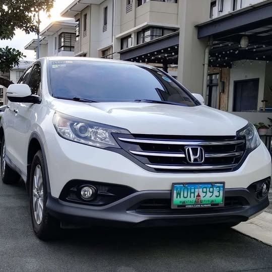 Honda CR-V 2.0 i-VTEC (A) (Category: Used Cars) located in San Juan City. Submitted by albramos (Listing ID 1461589251, Image 1). Description: Honda CR-V 2013 (Acquired 2014) Helping a friend sell this well-maintained and very low mileage SUV. ✔ Model: Honda CR-V 2013 ✔ Acquired: 2014 ✔ Mileage: 79,000 km ODO (Very Low Mileage) ✔ Color: White ✔ Condition: Excellent, Ready for Long Drive – All stock ✔ Interior: Intact and very clean ✔ Registration