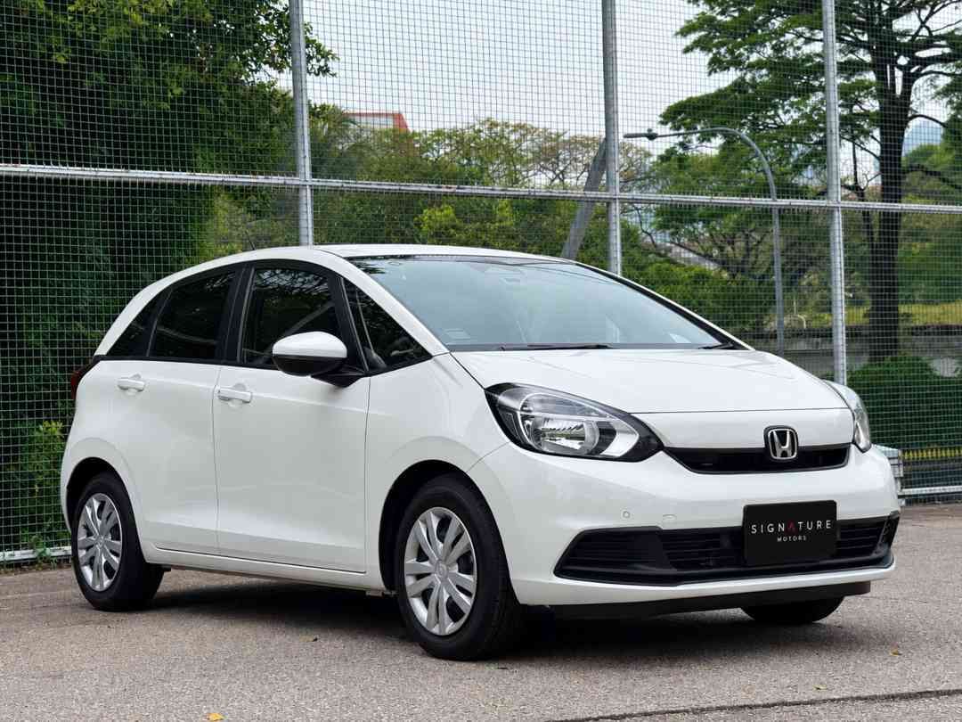 HONDA FIT BASIC 1.5 CVT (Category: Used Cars) located in Singapore. Submitted by signaturemotors (Listing ID 1461621441, Image 2). Description: Showroom: 237 ALEXANDRA ROAD 237 Alexandra Road #02-04 Singapore 159929 1 Owner! Come With 5-Years Warranty & Free Servicing From Reg Date. A Smart & Hassle-Free Choice For Daily Driving. Compact Yet Spacious, Fuel-Efficient & Easy To Handle. Ideal For Drivers Of All Experience Levels. High Trade In Welco