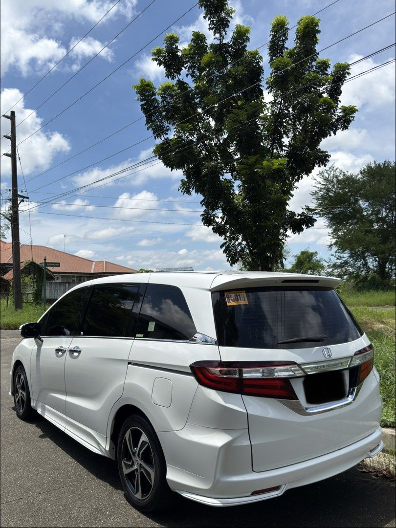 Honda Odyssey 2.4 EXV Premium (A) (Category: Used Cars) located in Manila. Submitted by cosmic.vespa (Listing ID 1461598921, Image 2). Description: FOR SALE ONE OF THE FRESHEST ODYSSEY IN THE MARKET 2015 MODEL 2016 RELEASED FIRST OWNED ACQUIRED(CHAIRMAN CAYLUM TRADING) HONDA ODYSSEY EX-V NAVI TOP OF THE LINE CBU From JAPAN 7 SEATERS 2.4 VTEC EARTH DREAMS ENGINE AUTOMATIC TRANSMISSION 63K MILEAGE ONLY CASA MAINTAINED SINCE DAY 1 COMPLETE MANUALS A