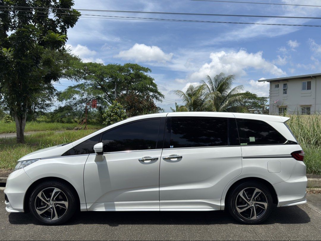 Honda Odyssey 2.4 EXV Premium (A) (Category: Used Cars) located in Manila. Submitted by cosmic.vespa (Listing ID 1461598921, Image 3). Description: FOR SALE ONE OF THE FRESHEST ODYSSEY IN THE MARKET 2015 MODEL 2016 RELEASED FIRST OWNED ACQUIRED(CHAIRMAN CAYLUM TRADING) HONDA ODYSSEY EX-V NAVI TOP OF THE LINE CBU From JAPAN 7 SEATERS 2.4 VTEC EARTH DREAMS ENGINE AUTOMATIC TRANSMISSION 63K MILEAGE ONLY CASA MAINTAINED SINCE DAY 1 COMPLETE MANUALS A