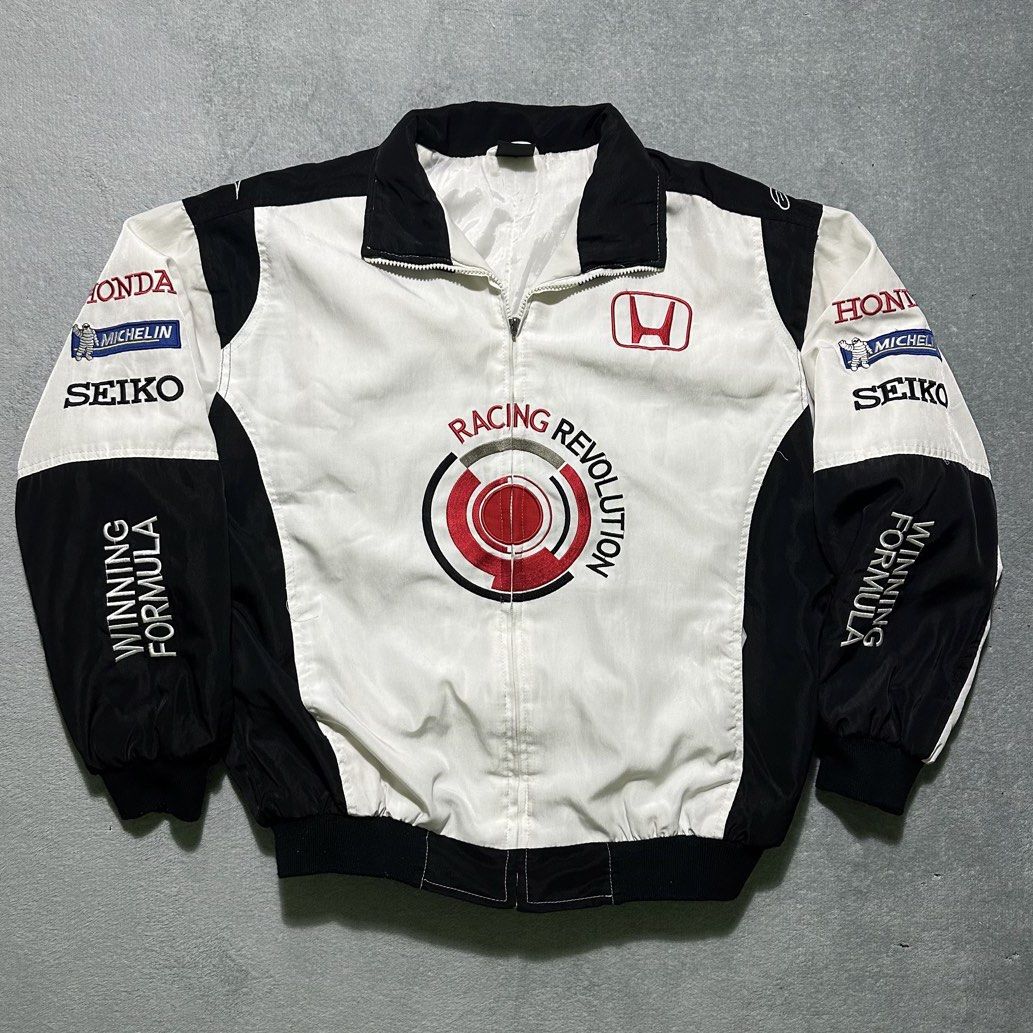 Honda Racing Revolution Bomber Jacket (Category: Coats, Jackets and Outerwear) located in Bayombong. Submitted by rochelle_archive_garments (Listing ID 1461323049, Image 1). Description: - Cool Honda racing jacket - 'Racing Revolution' graphic on front - Honda logos on chest and sleeves - Black and white colorway with red accents - Zipper closure - Estimated size: XL - Ideal for Honda enthusiasts.