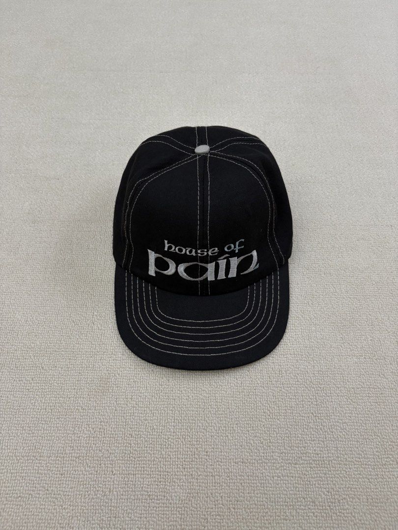 House Of Pain Hat (Category: Caps & Hats) located in Manila. Submitted by porma.market (Listing ID 1461578320, Image 2). Description: - Classic black baseball cap - Embroidered 'House of Pain' logo on the front - White stitching details for a clean look - Unique light blue shamrock design inside - Adjustable strap for a customized fit - Ideal for casual wear and everyday outfits - Gems💎 -90s hat.