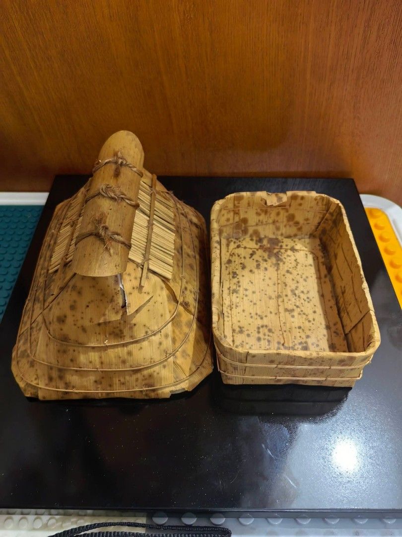 House-shaped Native Container (Category: Other Home Decor) located in Cebu City. Submitted by dudes_villanueva (Listing ID 1461660041, Image 3). Description: House-shaped Native Container or Trinket Box 📌 Crafted from bamboo sheath (také-kawa in Japanese craft styles or similar tropical plant fiber/bamboo leaf crafts), featuring a layered thatched-style roof. 📌 Specks are natural. Not an issue. See all pics for condition. L7.25xW5xH4.5 in.