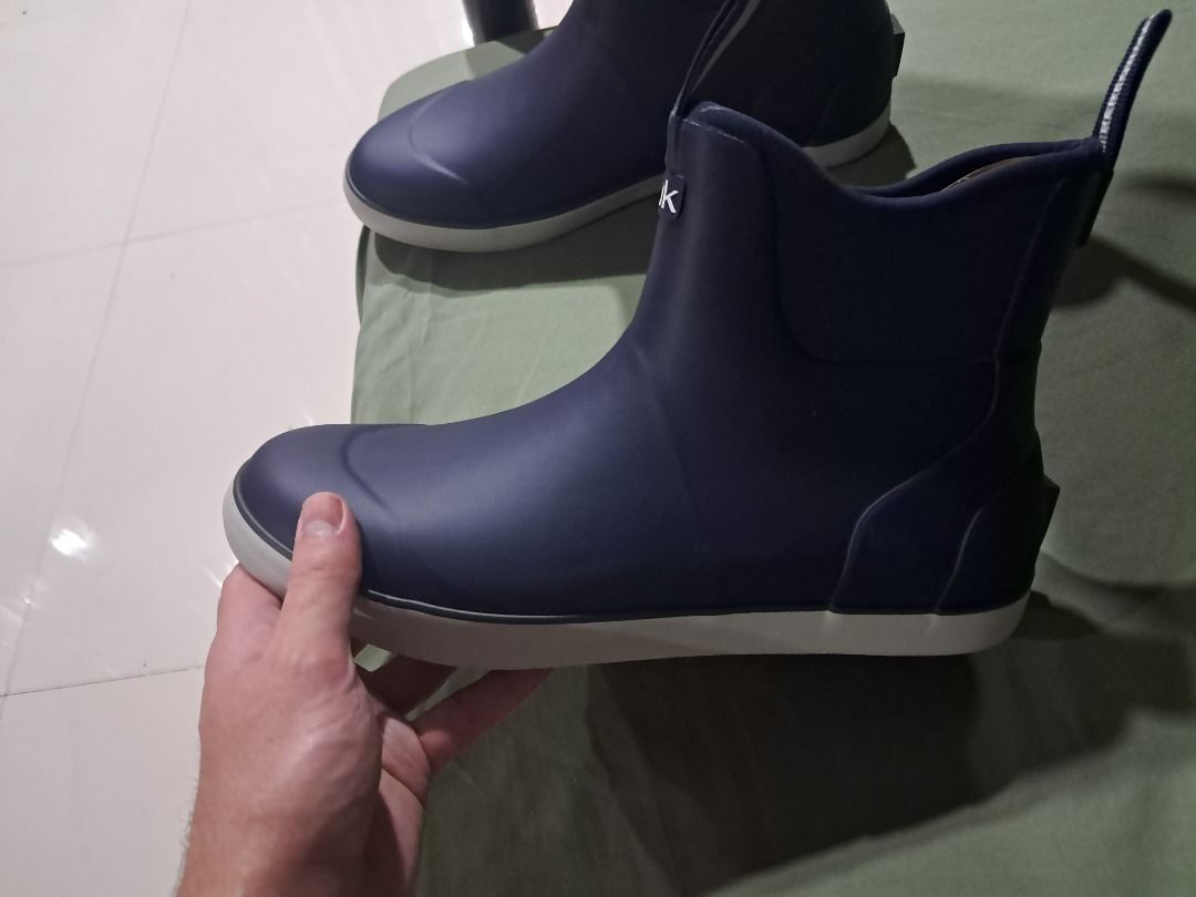 Huk Navy Rubber Deck Boots Size 11 (Category: Boots) located in Laoag. Submitted by mysticfalcon_fe78be (Listing ID 1461794699, Image 2). Description: - Navy blue Huk deck boots - Size: 11 US / 10 UK / 45 EUR / 29 CM - Material: Rubber upper and outsole - Features: Textile inner lining, waterproof, durable - Ideal for: Fishing, wet weather - Design: Easy slip-on and off Purchased in Australia, Australian seller. Selling because not my size..