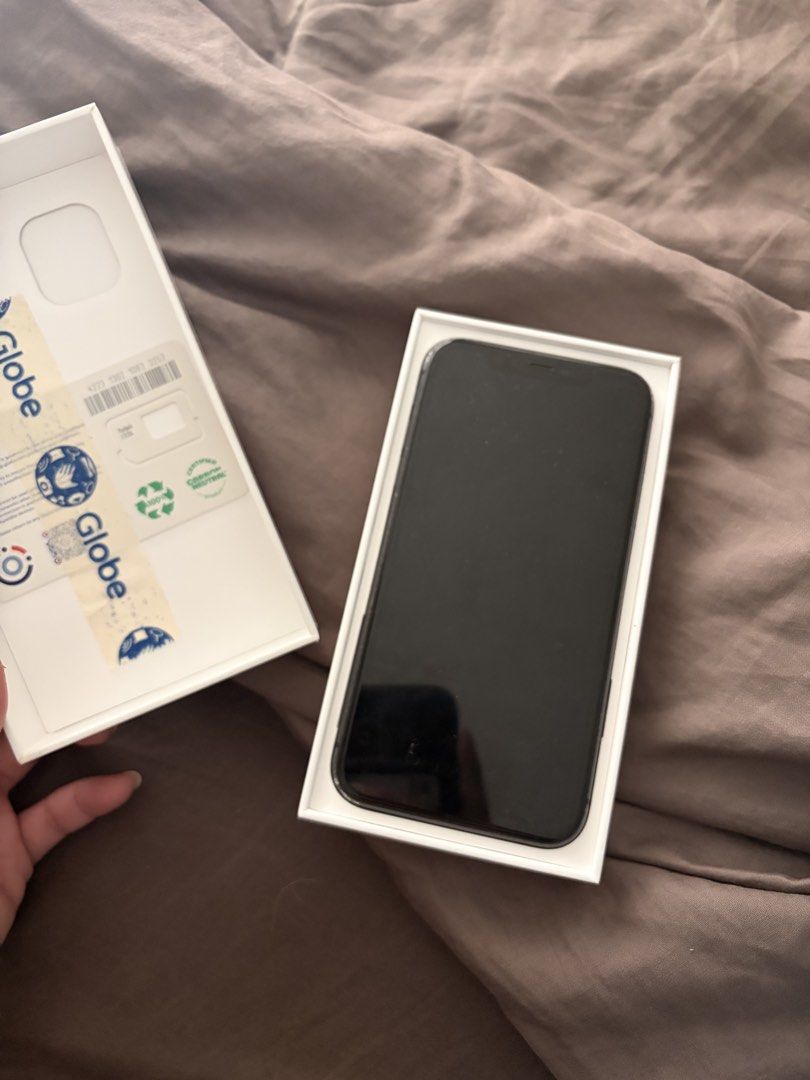 iPhone 11 (Category: iPhone 11 Series) located in Manila. Submitted by nadinegloria (Listing ID 1461620098, Image 2). Description: All functions okay Some scratches Reset to factory settings With box and instructions Price negotiable.