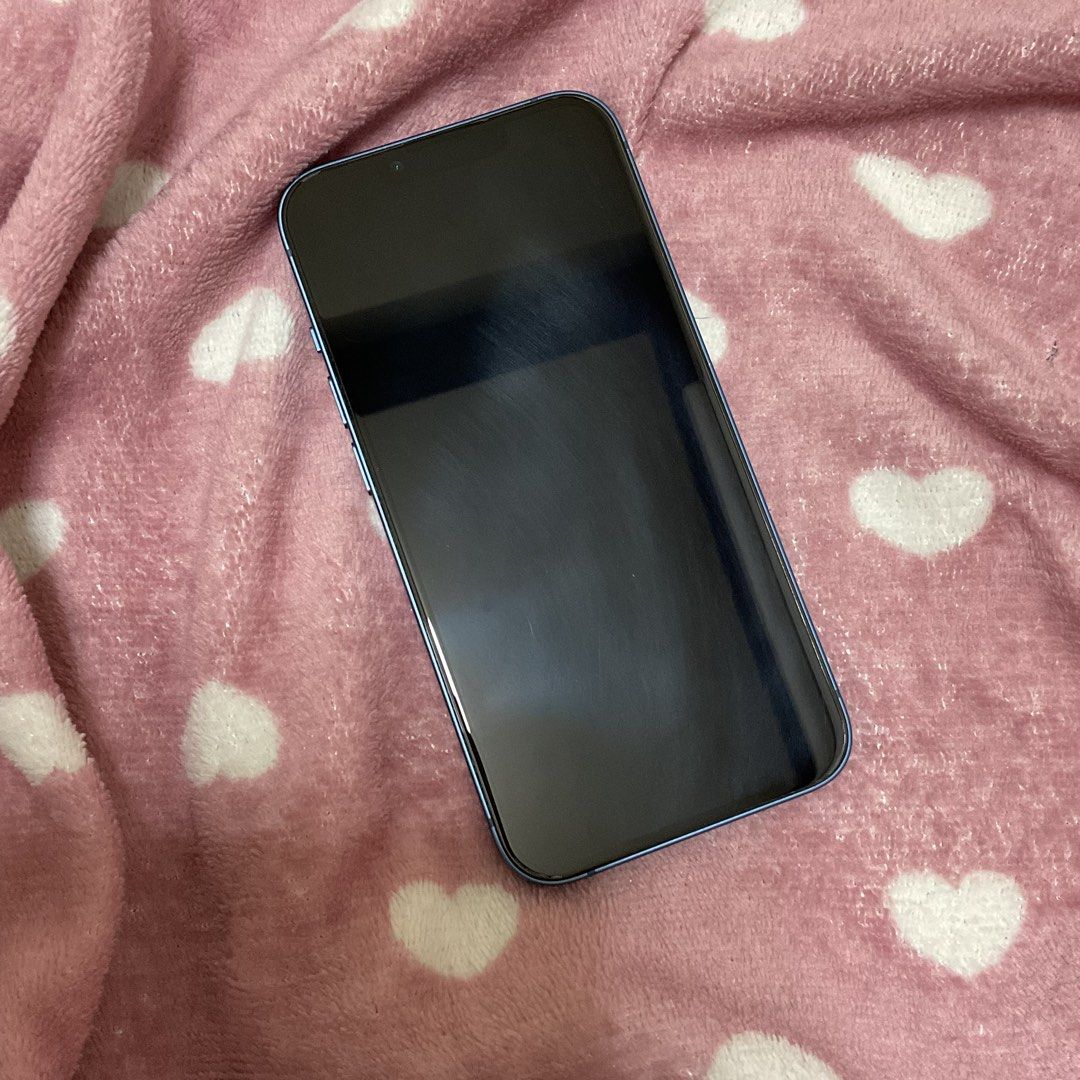 iPhone 13 256GB (Category: iPhone 13 Series) located in Antipolo. Submitted by declutteredthrifts (Listing ID 1461758340, Image 3). Description: - 256GB in blue - battery health maximum capacity: 76% - no sim restrictions - no history of repairs - no glass cracks and scratches - minor paint chip on camera borders - inclusions: > box > original charging cable > original iphone (product red) liquid silicone case > black otterbox otterpop phone case