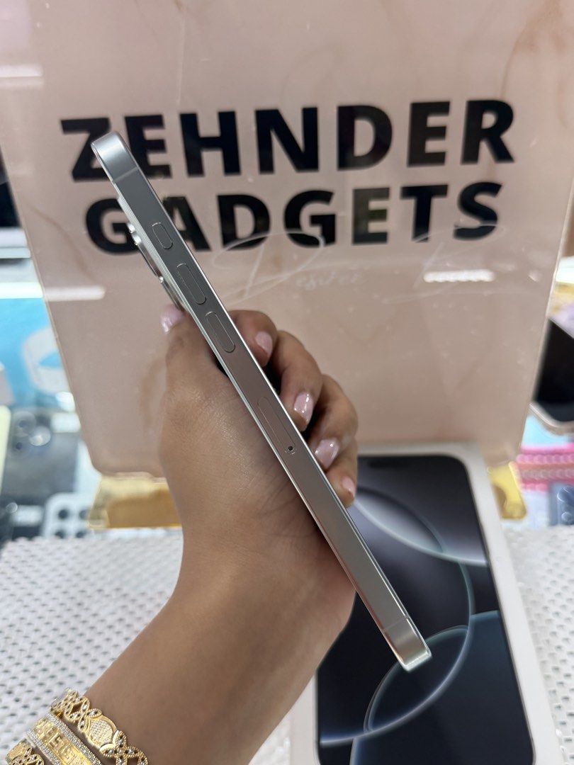 iPhone 16 PRO MAX 512GB OPENLINE (NTC APPROVED) (Category: iPhone 16 Series) located in San Juan City. Submitted by desireebayal96 (Listing ID 1461599975, Image 2). Description: iPhone 16 PRO MAX (WHITE TITANIUM) * NTC APPROVED * OPENLINE (ANY SIM) * 512GB * 89% BATTERY HEALTH (ORIGINAL NOT BOOSTED) * 98% SMOOTH * NO ISSUE * NO HISTORY OF REPAIR * NOT REFURBISHED * NO ICLOUD ISSUE * WORKING FACE ID & TRUETONE * WITH CORD TYPE-C * WITH BOX SAME SE