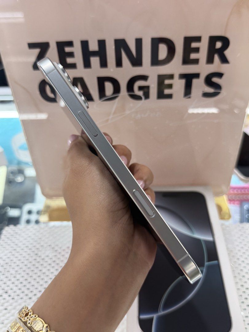 iPhone 16 PRO MAX 512GB OPENLINE (NTC APPROVED) (Category: iPhone 16 Series) located in San Juan City. Submitted by desireebayal96 (Listing ID 1461599975, Image 3). Description: iPhone 16 PRO MAX (WHITE TITANIUM) * NTC APPROVED * OPENLINE (ANY SIM) * 512GB * 89% BATTERY HEALTH (ORIGINAL NOT BOOSTED) * 98% SMOOTH * NO ISSUE * NO HISTORY OF REPAIR * NOT REFURBISHED * NO ICLOUD ISSUE * WORKING FACE ID & TRUETONE * WITH CORD TYPE-C * WITH BOX SAME SE