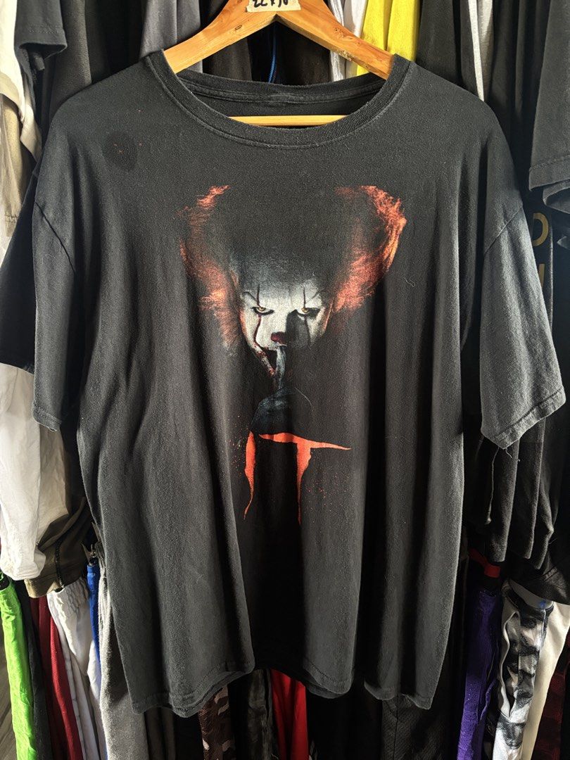 It shirt (Category: Tshirts & Polo Shirts ) located in Taguig. Submitted by nardselect (Listing ID 1461573090, Image 1). Description: It YOU WILL FLOAT shirt Tag Size: L Width: 22 Length: 30 Condition: Good Flaws: Has a small paint stain see on last pic .