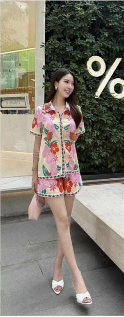 Jariya Floral Print Coords (Category: Undergarments & Loungewear) located in Marikina City. Submitted by jlntndc (Listing ID 1461677189, Image 1). Description: - Includes short sleeve collared top and matching shorts - Features pink, red, and green flowers on a cream background - Trimmed with a contrasting border - Comfortable and stylish for lounging BKK Premium Brand Size Small 32-34 bust 24-28 waistline Php 2,000 original price Selling for Php
