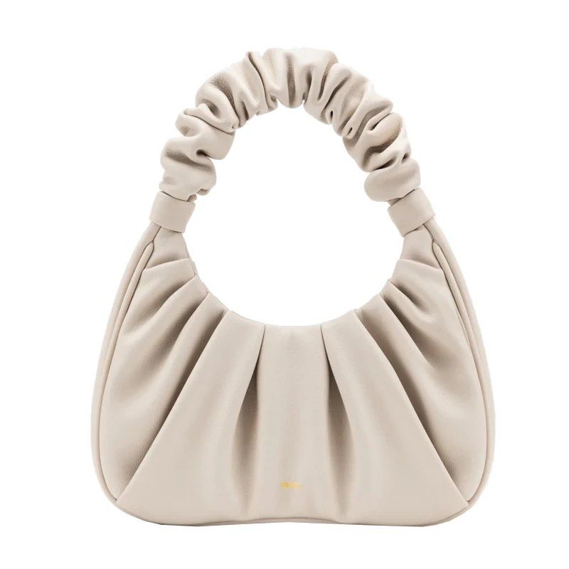 JW Pei GABBI Cream Ruched Shoulder Bag (Category: Shoulder Bags) located in Manila. Submitted by patc20 (Listing ID 1461606705, Image 1). Description: - Cream-colored JW Pei handbag - Features a stylish ruched handle - Made from soft, supple leather - Interior card slot for essentials - Ideal for everyday wear.