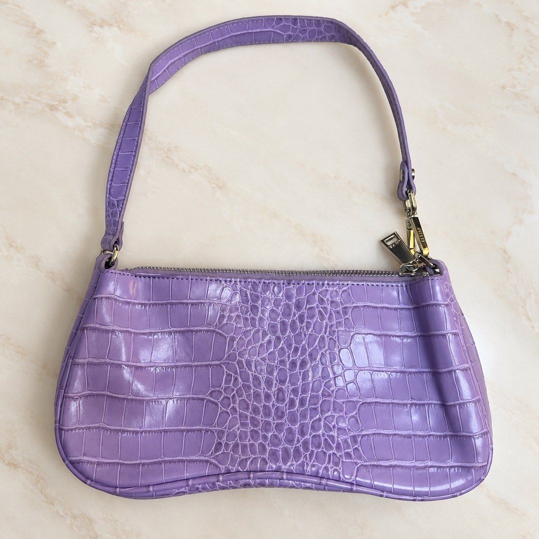 JW PEI Purple Croc Embossed Shoulder Bag (Category: Shoulder Bags) located in Makati City. Submitted by stylehub.mnl (Listing ID 1461568085, Image 1). Description: - Cute purple shoulder bag - Croc embossed texture - Zipper closure - Gold hardware details - Small size, perfect for essentials - Brand: JW PEI - Please check photos for more details.