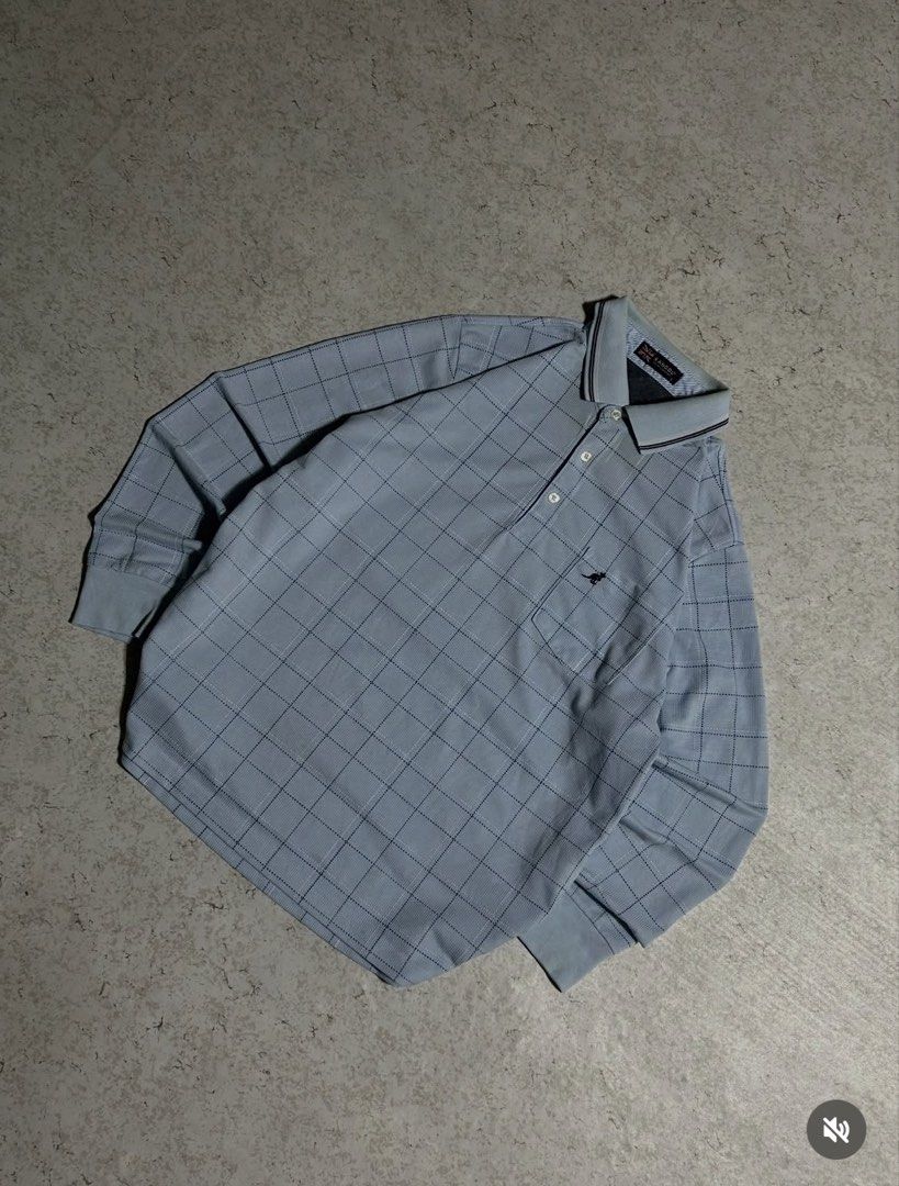 KANGOL Polo Longsleeve (Category: Coats, Jackets and Outerwear) located in Caloocan City. Submitted by true_roman_thrift (Listing ID 1461576369, Image 3). Description: Dimes : W20.5 x L25 Flaws : Neckline Good Condition.