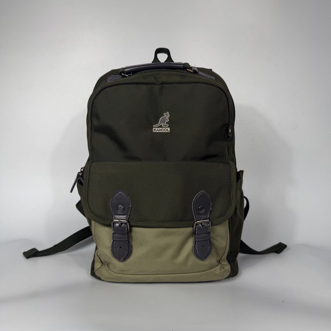 Kangol Small Backpack (Category: Backpacks) located in Bacolod City. Submitted by freshstuff13 (Listing ID 1461760593, Image 1). Description: - Brand: Kangol - Color: Green and Khaki two-tone - Closure: Buckle flap on front pocket - Main compartment with internal pockets - Padded straps for comfort - Ideal for everyday use or travel.