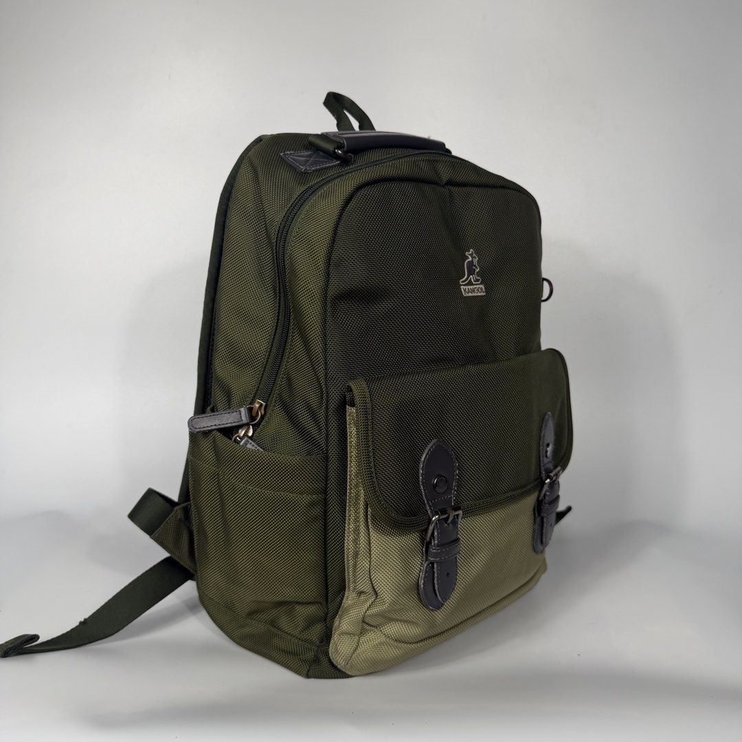 Kangol Small Backpack (Category: Backpacks) located in Bacolod City. Submitted by freshstuff13 (Listing ID 1461760593, Image 3). Description: - Brand: Kangol - Color: Green and Khaki two-tone - Closure: Buckle flap on front pocket - Main compartment with internal pockets - Padded straps for comfort - Ideal for everyday use or travel.