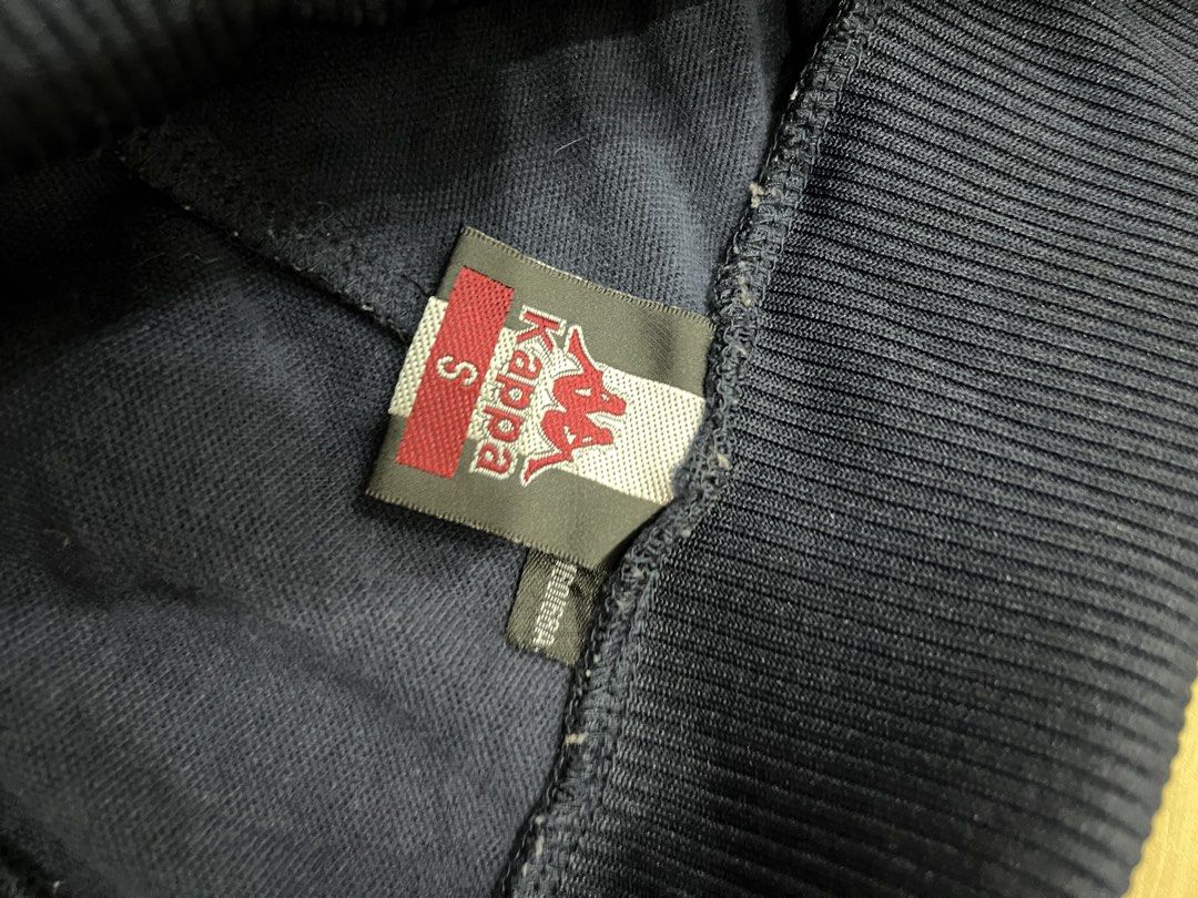 Vintage Track Pants (Category: Other Bottoms) located in Angeles City. Submitted by thriftsij (Listing ID 1461765225, Image 3). Description: - Vintage Navy blue Kappa track pants - Size S - Kappa logo on front - 'England' text on back - Elastic waistband with drawstring - Flare leg style - Ideal for casual wear or sports .