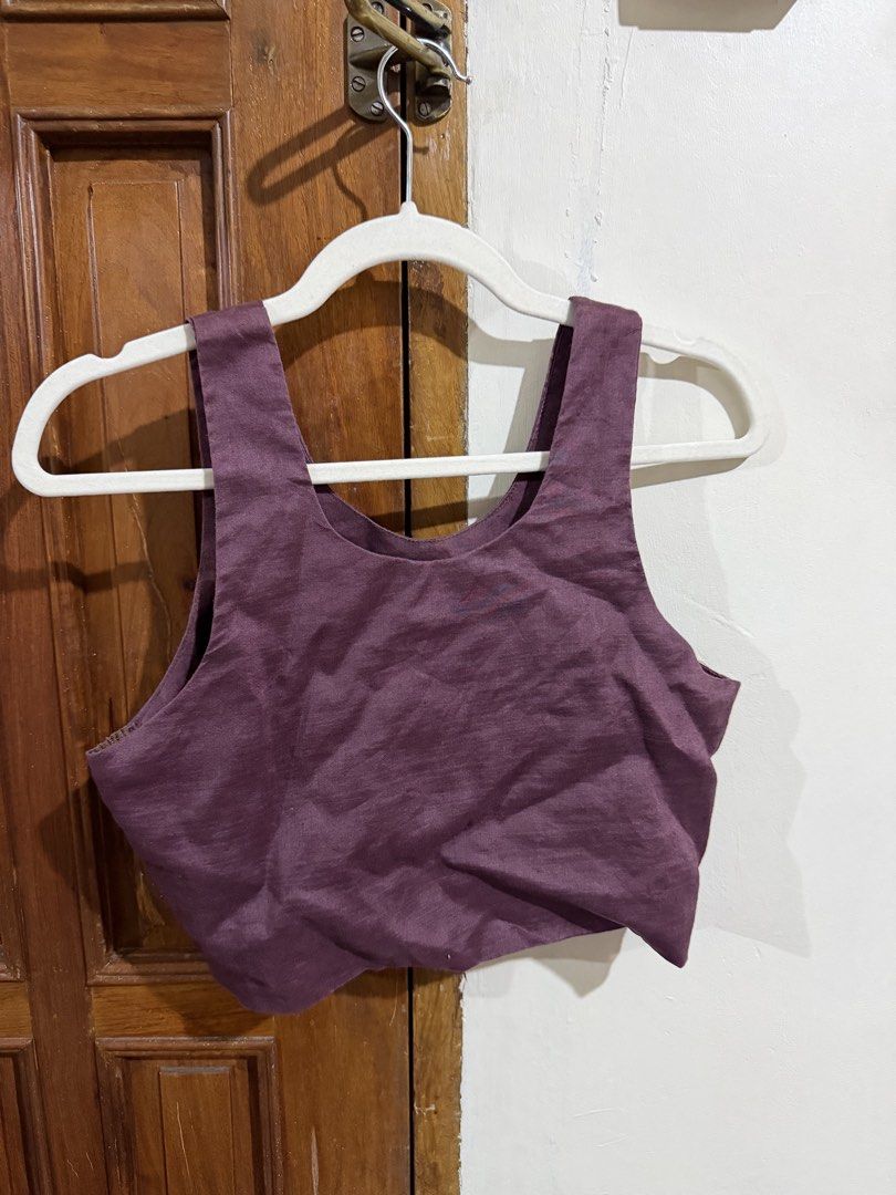 Kasikas Plum u-line cropped top (Category: Sleeveless) located in Quezon City. Submitted by latiendadejaye (Listing ID 1461624970, Image 2). Description: Needs ironing, but in good condition, with side zip, best fits S (slightly loose) to M In good condition, worn maybe once or twice. MOP: BPI, Gcash, Maya RFS: cleaning out my closet .