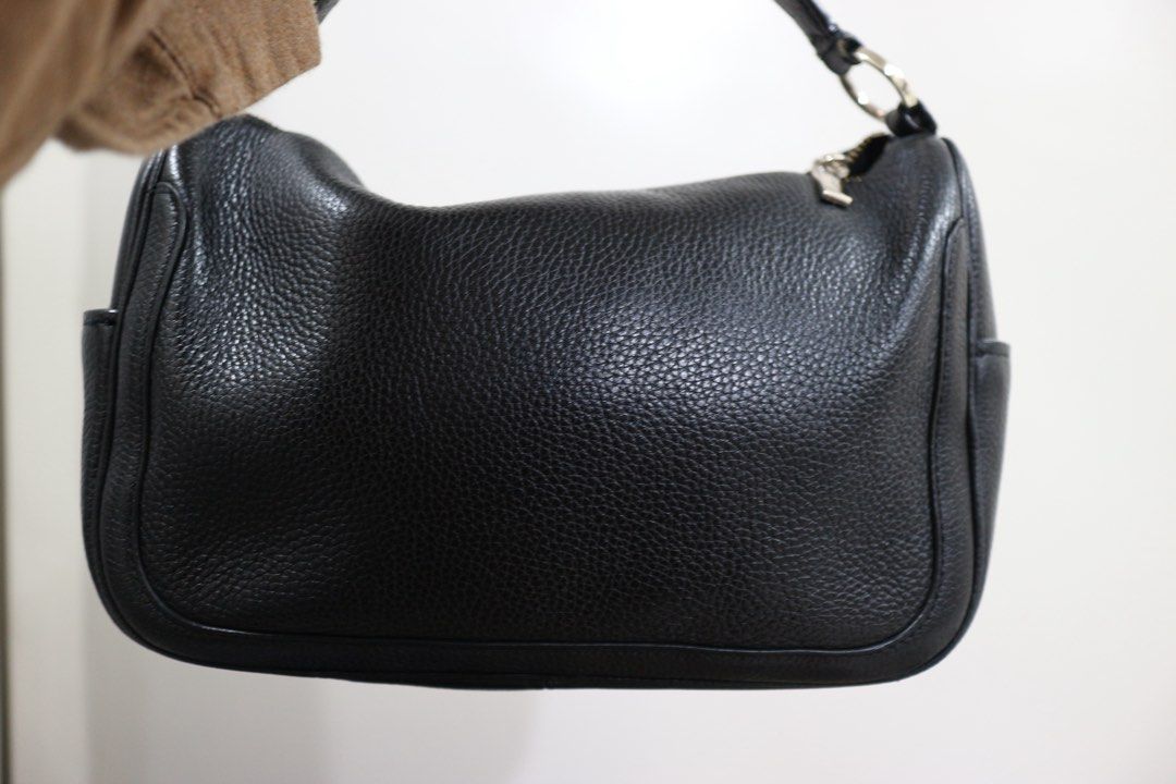 Kate Spade Black Leather Smoosh Crossbody Bag (Category: Cross-body Bags) located in Quezon City. Submitted by juvyjuvydoo (Listing ID 1461728126, Image 3). Description: - Authentic Kate Spade crossbody bag - Color: Black - Material: Pebbled leather - Closure: Zip top - Features: Side pockets, adjustable strap - Ideal for: Everyday wear.