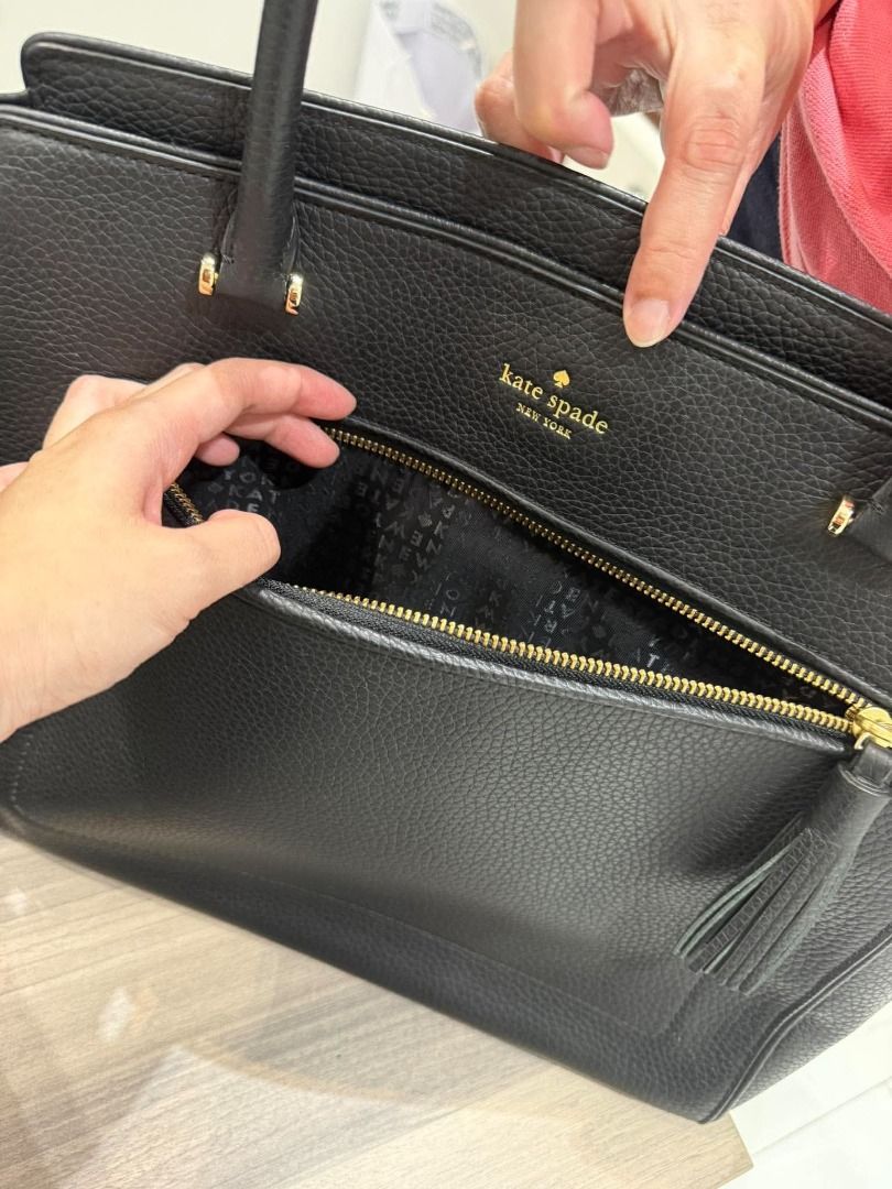 Kate Spade Black Leather Tote Bag (Category: Tote Bags) located in Caloocan City. Submitted by purefalcon.974eee (Listing ID 1461607035, Image 3). Description: - Classic black leather tote from Kate Spade New York - Pebbled leather finish - Front zip pocket with tassel detail - Multiple interior compartments and a zip pocket - Gold hardware - Comes with dust bag - Ideal for everyday use 100% Authentic .