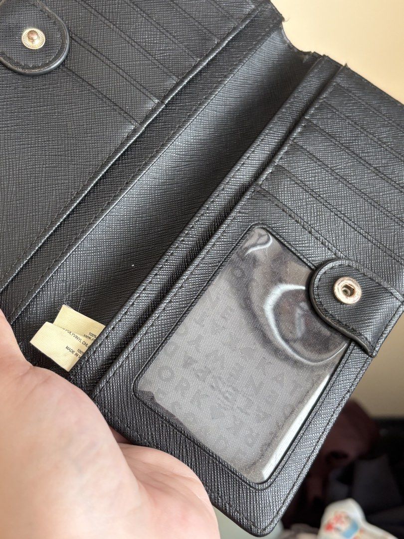 Kate Spade Black Wallet (Category: Wallets & Card holders) located in Dasmarinas. Submitted by aubreyanabee (Listing ID 1461717619, Image 3). Description: - Authentic Kate Spade wallet - Color: Black - Material: Saffiano leather - Features: Multiple card slots, clear ID window - Closure: Snap closure .