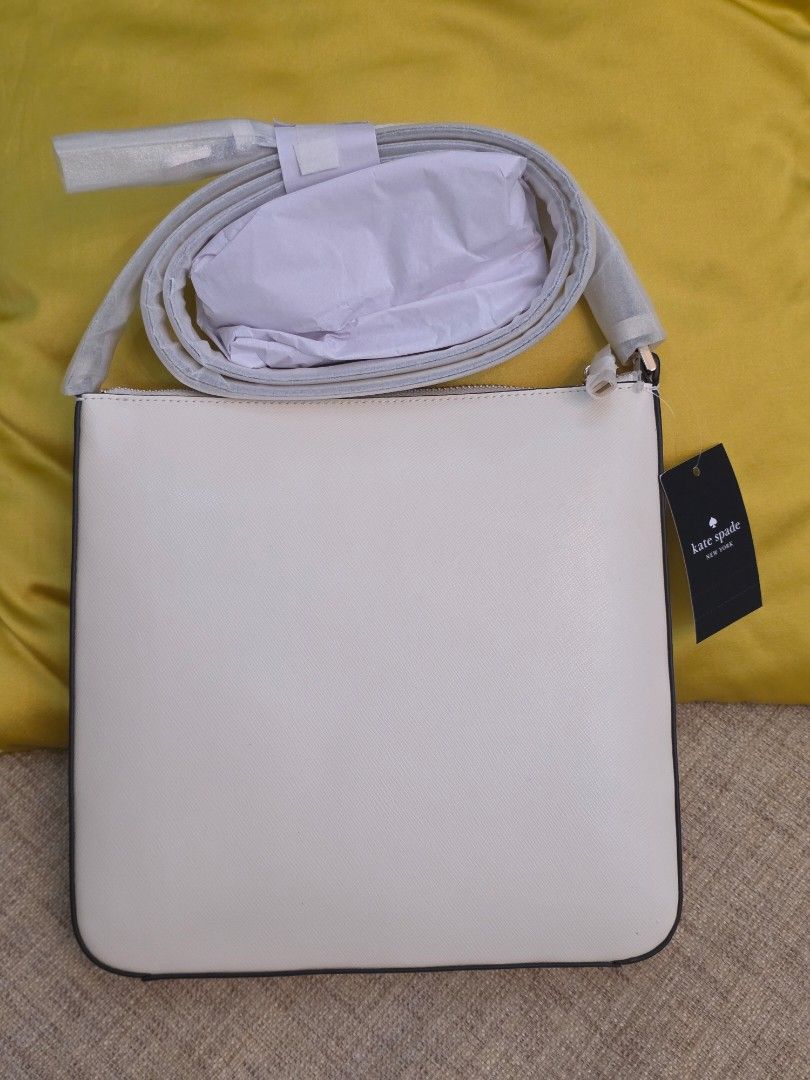 Kate Spade Sadie Large Crossbody (Category: Cross-body Bags) located in San Juan City. Submitted by mia.concep (Listing ID 1398134318, Image 2). Description: Kate Spade Sadie Large Crossbody RFS: Impulse Buy - Saffiano Leather - 2 Way Script Logo Lining - Size Length: 9.68" Height: 9.4" Width: 1.28" - Strap drop: 22" - Exterior: front zip pocket - Interior: front slip pocket; back zip pocket - Zip closure - Foil Embossed With Spade - Dust Bag Not
