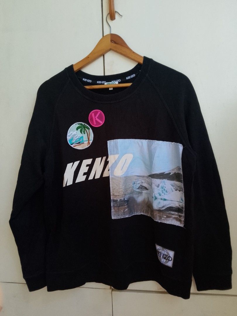 Kenzo Black Sweatshirt Size L (Category: Coats, Jackets and Outerwear) located in Bogo. Submitted by algarme2018 (Listing ID 1461623222, Image 1). Description: - Brand: Kenzo - Item: Sweatshirt - Color: Black - Features: Graphic patches, KENZO logo - Size: L - Origin: Made in Portugal - Occasion: Casual wear.