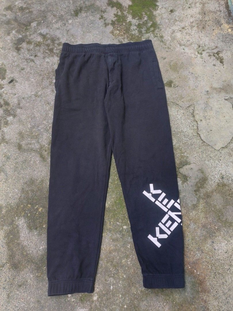 Kenzo Sweatpants (Category: Trousers) located in Quezon City. Submitted by jmthrift3000 (Listing ID 1461599148, Image 1). Description: Kenzo Sweatpants - Complete w tag and washtag - Size 36-38 Waistline - Excellent Condition - No Issue - With Kenzo Cross design.
