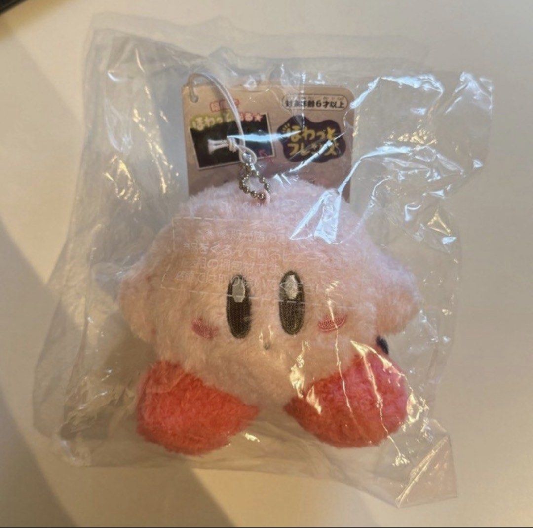 Kirby Character Plush mascot charm keychain (Category: Charms) located in Manila. Submitted by vantes.rosie (Listing ID 1461672338, Image 1). Description: - From Kirby Cafe Japan - Original, authentic - New never used - fixed price Product size: H90 x W110 x D100mm .