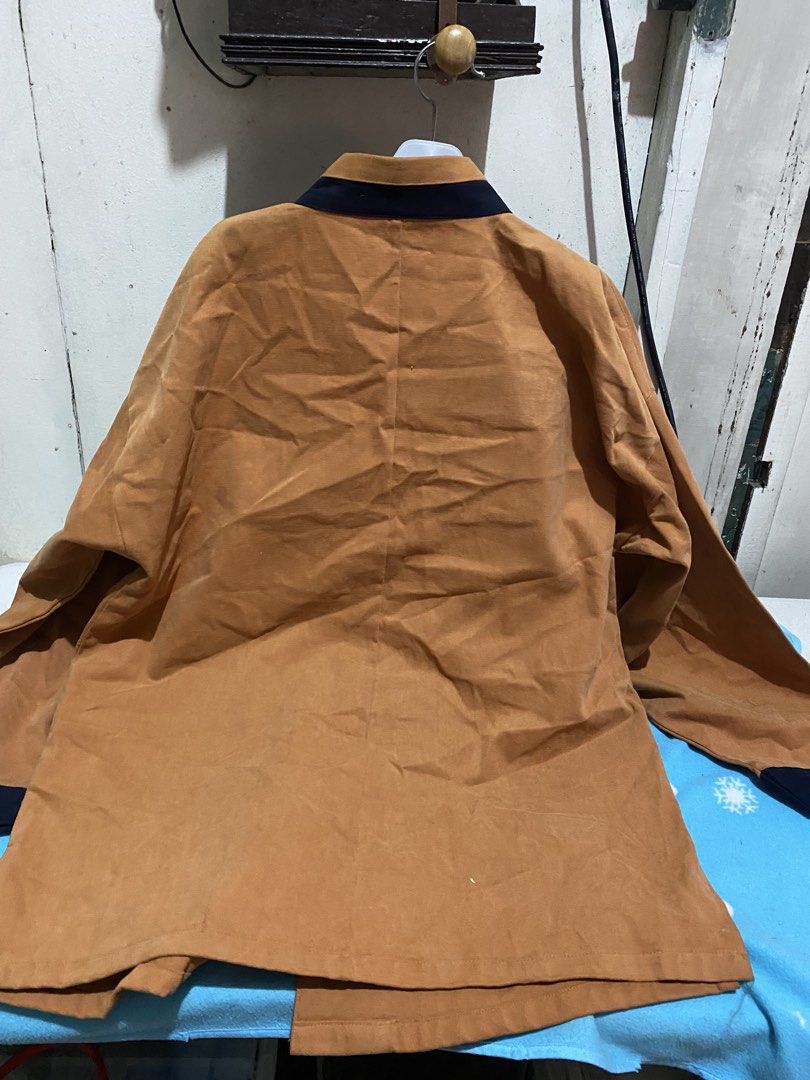 Korean Traditional Style Jacket - Size Large (Category: Coats, Jackets and Outerwear) located in Manila. Submitted by resi.diaz (Listing ID 1461616713, Image 3). Description: - Unique brown jacket with navy blue trim - Features a distinctive knot closure and decorative buttons - Long sleeves with navy cuffs - Made in Korea - Tag: '도령춘향이' - Size: '大' (Large) - Approximate Measurements: Chest 23 inches, Length 30 inches.