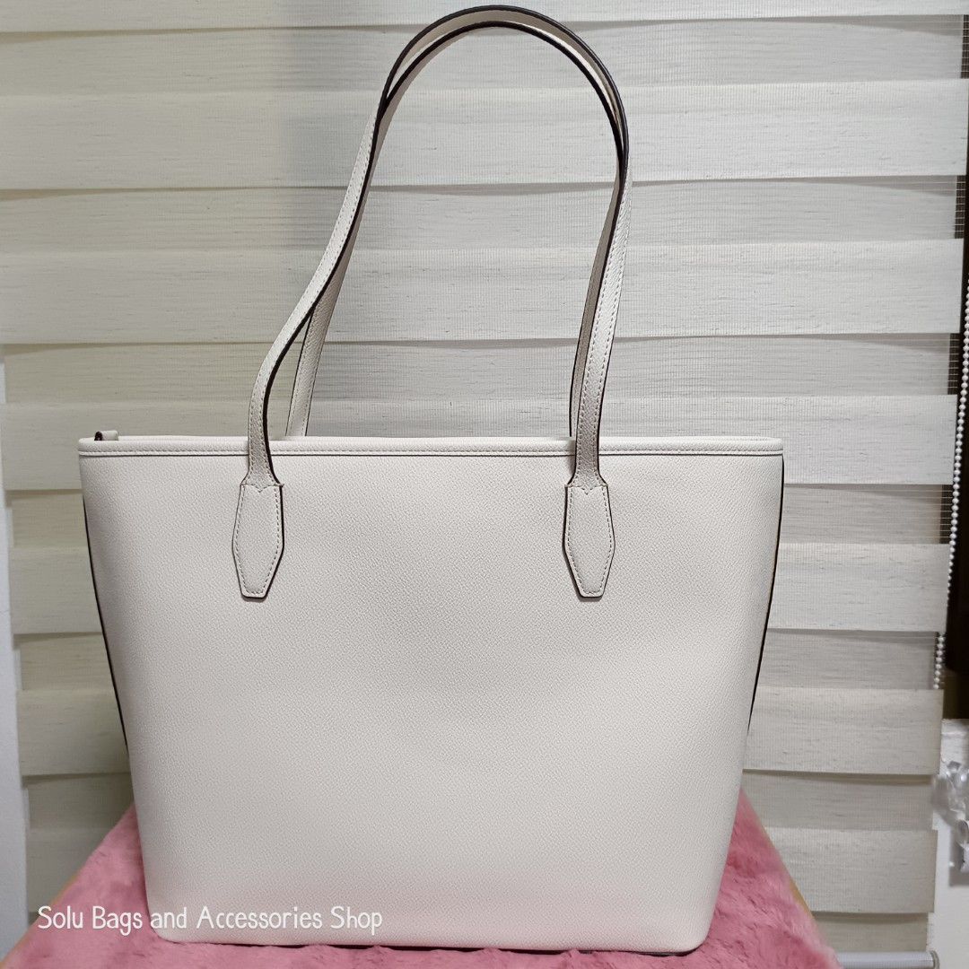 Kate Spade Lori Tote Bag (Category: Tote Bags) located in Taguig. Submitted by mommasolu (Listing ID 1461589748, Image 3). Description: ❣️On hand and ready to ship ❣️All items are original and authentic from 🇺🇸 Shipping: J&T ‼️Same Day Shipping via GrabExpress or Lalamove for Metro Manila (payment first) MOP: GCash and Bank Transfer via BPI or GoTyme Follow our socials: FB 👉 Solu Bags and Accessories Shop IG 👉 solu.bagsandaccessories Tiktok �