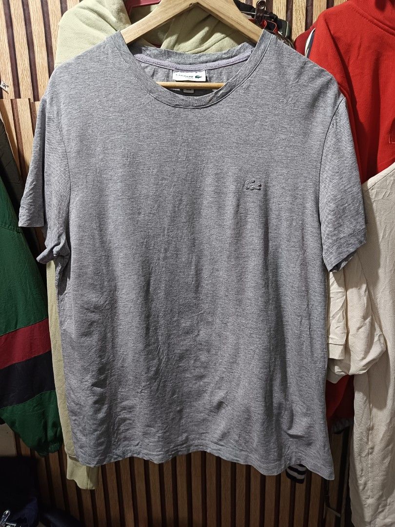 Lacoste classic fit cotton shirt (Category: Tshirts & Polo Shirts ) located in Cebu City. Submitted by negotiableprice22 (Listing ID 1461613623, Image 1). Description: Lacoste classic fit cotton shirt size M / size 4 grey / neutral color have logo in front and back spell out Lacoste Dimes Width 21 inch Length 27.5 inch item need wash maganda to sa casual meet up nyo available price negotiable.