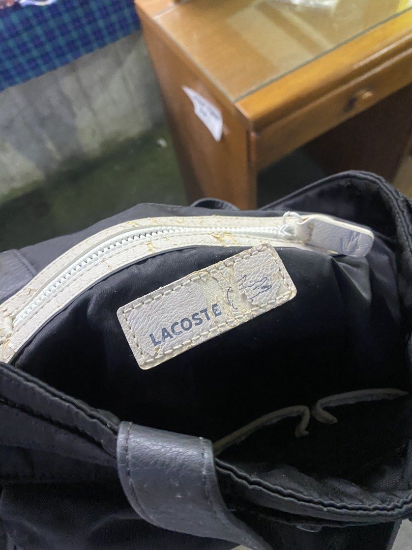 Lacoste hand bag (Category: Announcements) located in Manila. Submitted by thrifttodays. (Listing ID 1461595793, Image 3). Description: Lacoste hand bag Good condition Pwede lagayan ng loptop Medyo malaki den .