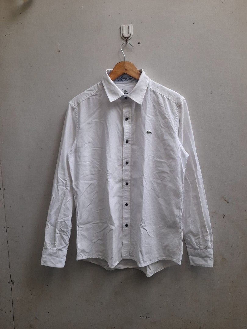 Lacoste Oxford LS Shirt (Category: Formal Shirts) located in Iloilo. Submitted by mnky.bsns03 (Listing ID 1461707797, Image 1). Description: 9.5/10 Color rate No issues 28.5 Front 29.5 Back Length 21 Width.