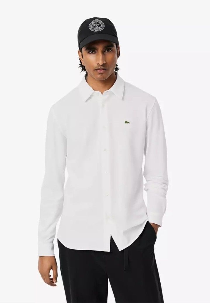 Lacoste Oxford LS Shirt (Category: Formal Shirts) located in Iloilo. Submitted by mnky.bsns03 (Listing ID 1461707797, Image 2). Description: 9.5/10 Color rate No issues 28.5 Front 29.5 Back Length 21 Width.