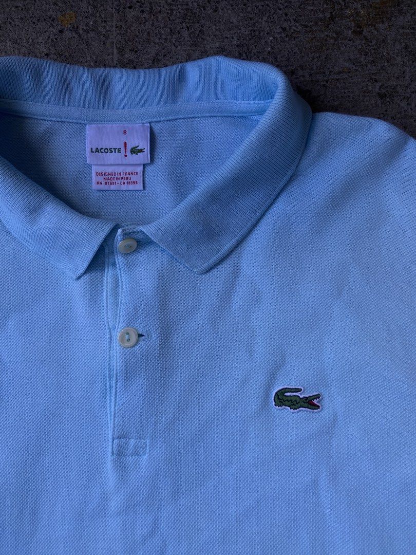Lacoste Polo Shirt (Category: Tshirts & Polo Shirts ) located in Kalibo. Submitted by bryaninosa20819 (Listing ID 1461583777, Image 2). Description: Lacoste Polo Shirt Dimes : 21x29 Very Good Condition Color Rate 9/10 Need Wash Issue 1 small pinhole sa back.