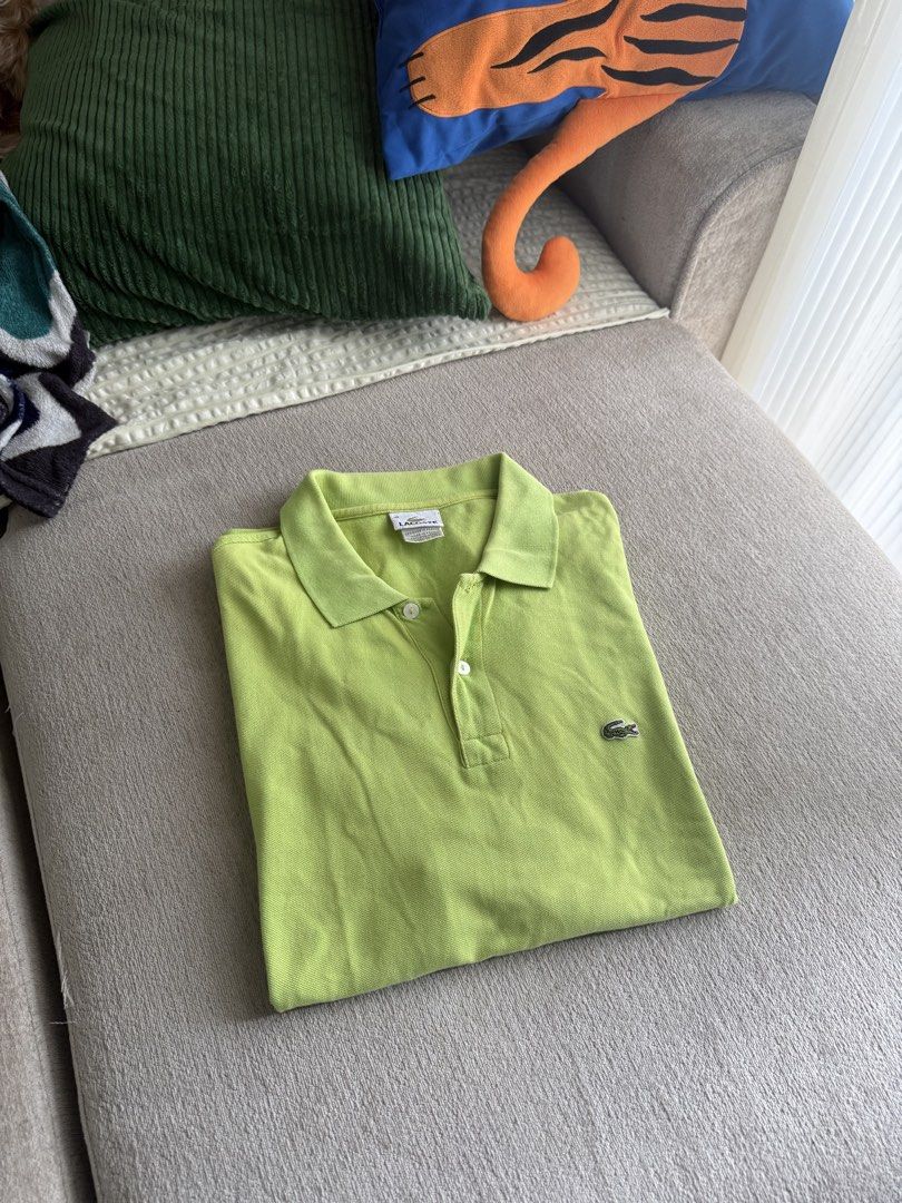 Lacoste Polo Shirt (Category: Tshirts & Polo Shirts ) located in Quezon City. Submitted by bigrackzzz (Listing ID 1461639869, Image 1). Description: - Classic lime green Lacoste polo shirt - Iconic crocodile logo on chest - Made in Peru - Simple and comfortable design - Great for casual wear - Altered 22x28.